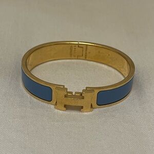 Hermès Gold and Blue “Clic H” Bracelet